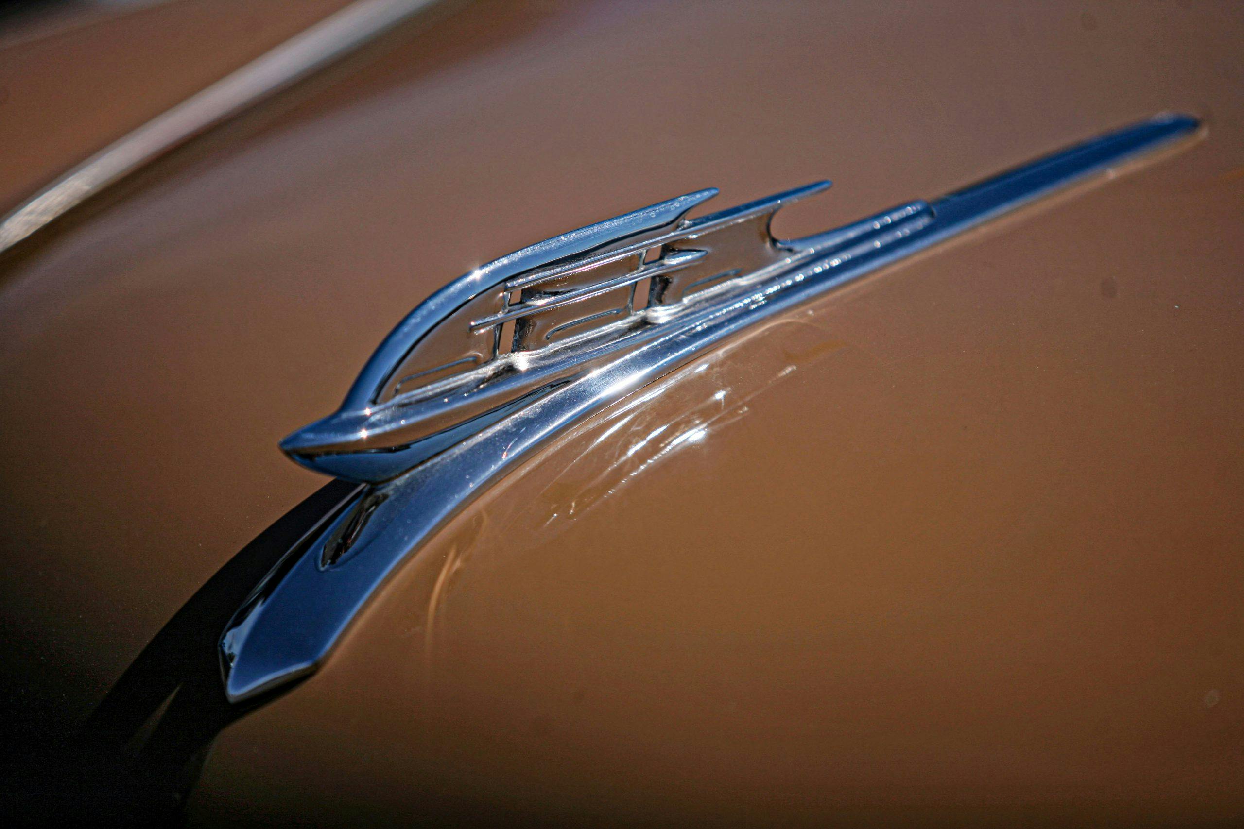 1953 Plymouth Hood Ornament Brown