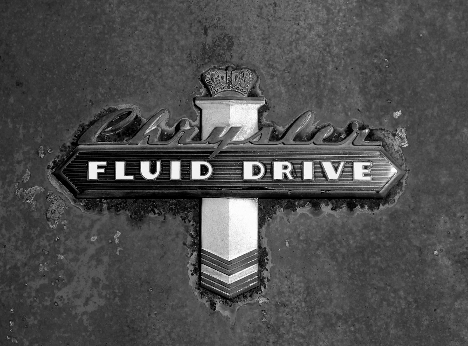 Chrysler Fluid Drive emblem black white