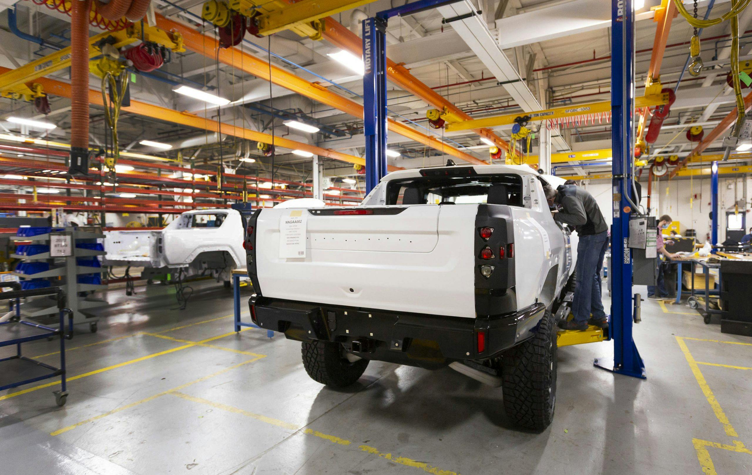 Two GMC HUMMER EVs completing their builds prior to shipping
