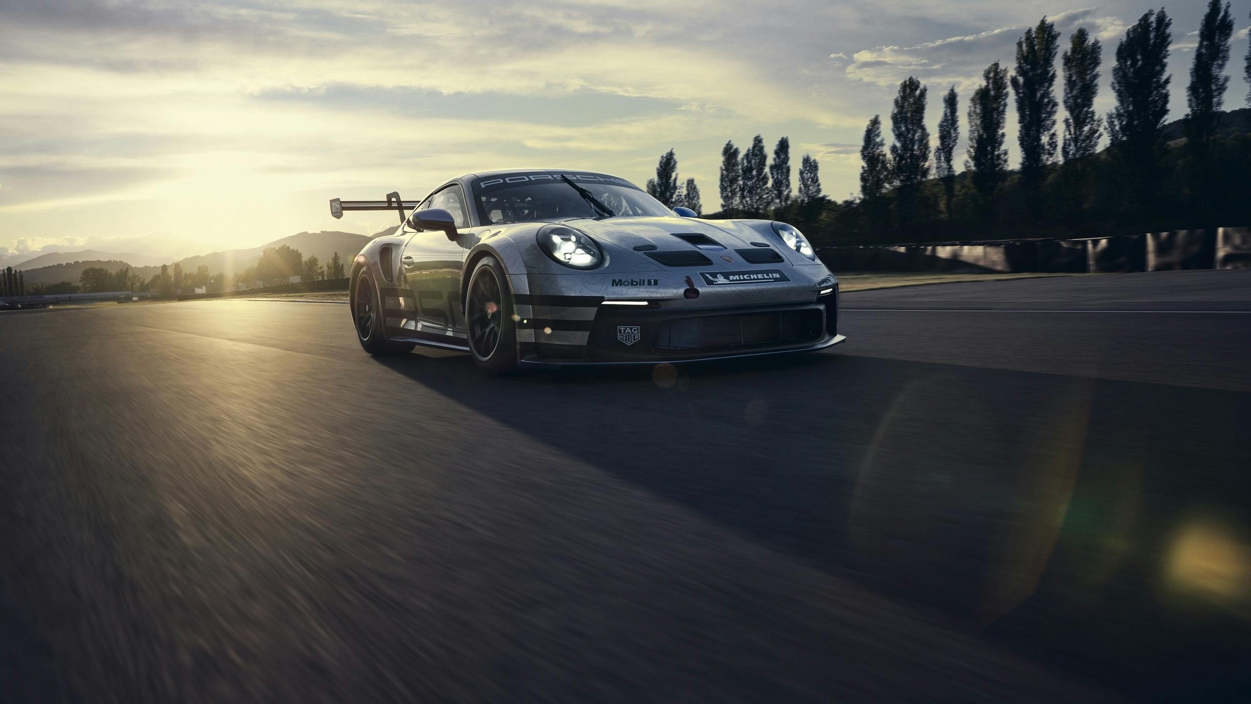 Porsche 911 GT3 front three-quarter dynamic track action