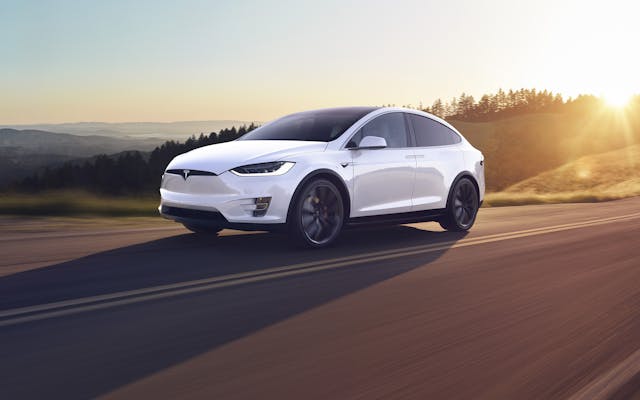Tesla Model X front three-quarter dynamic action