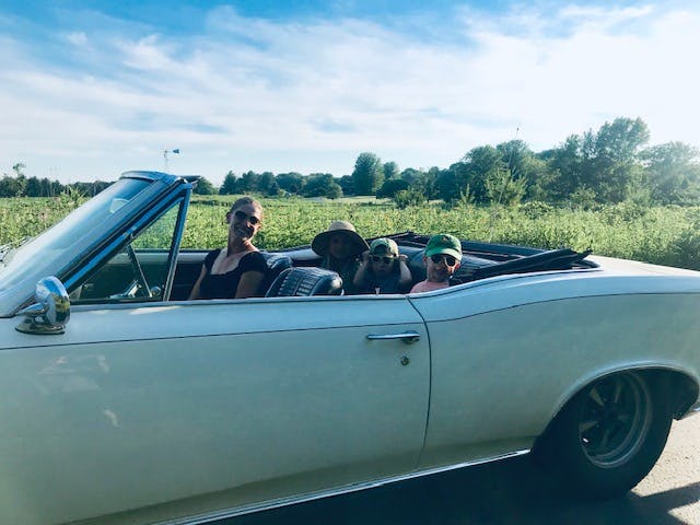 GTO convertible family in car