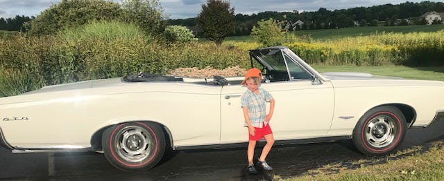 GTO convertible and kid