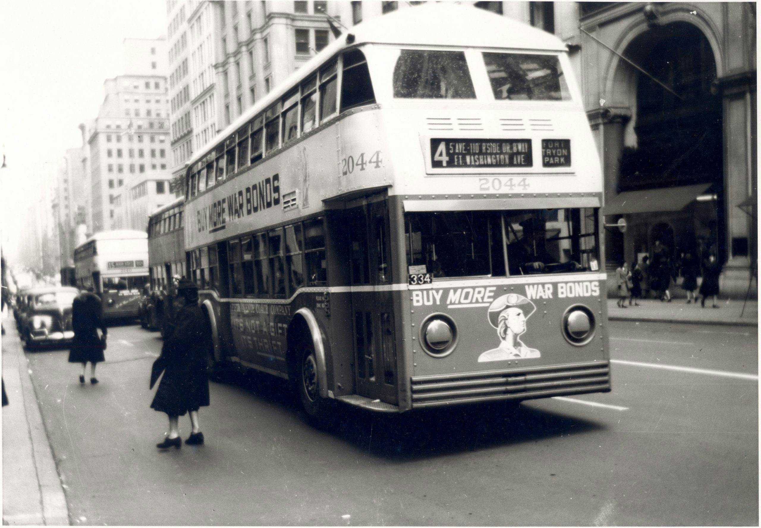 double decker bus advertises war bonds on fifth avenue