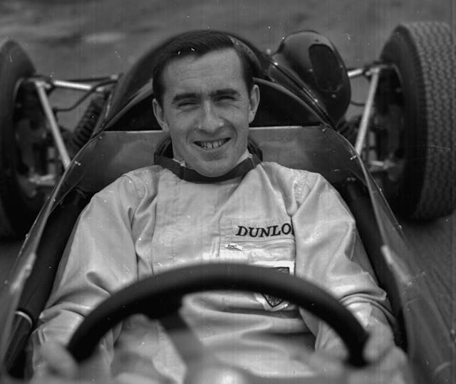 Jackie Stewart in driving overalls