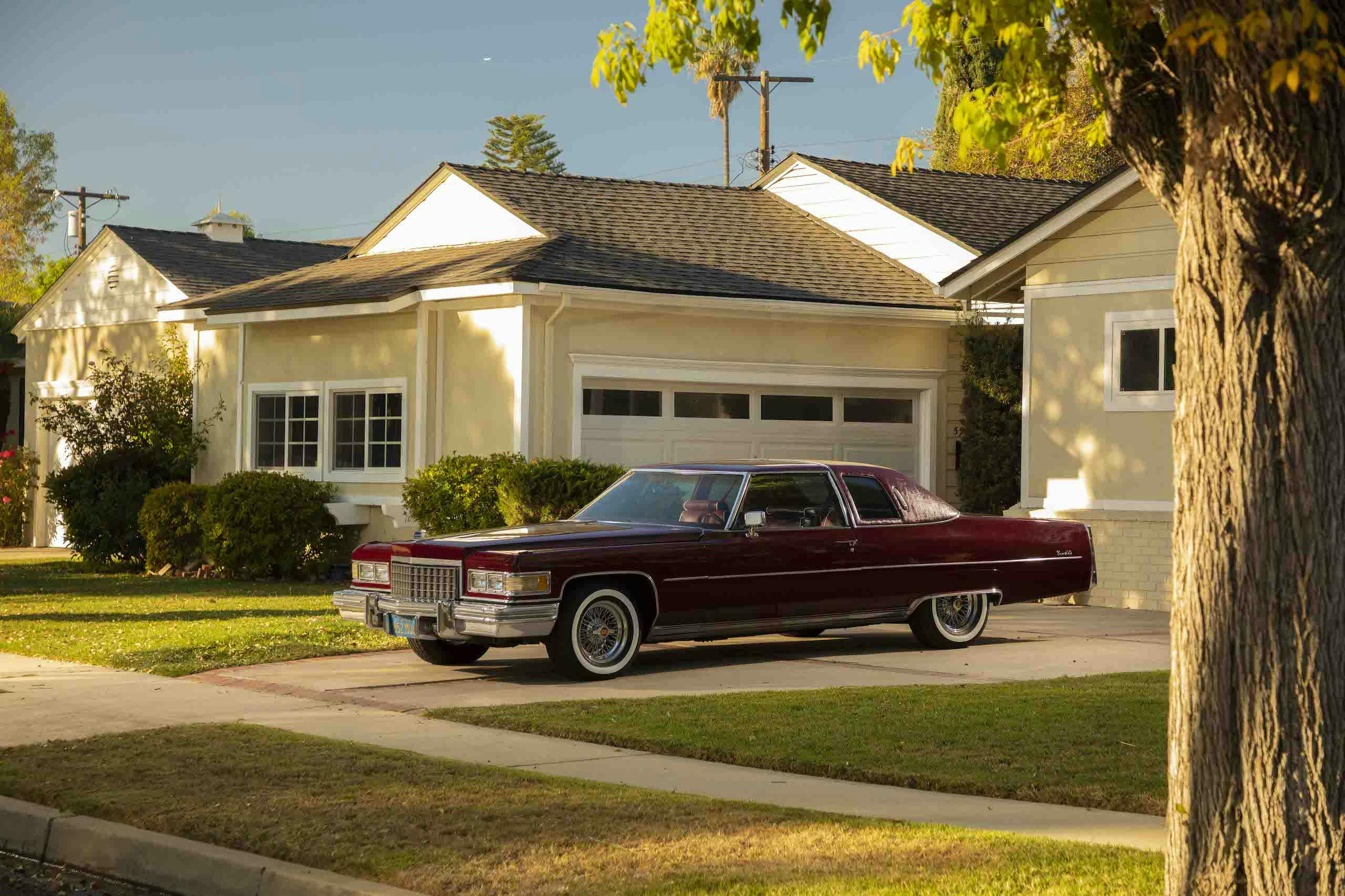 1976 Cadillac Coupe DeVille front three-quarter driveway