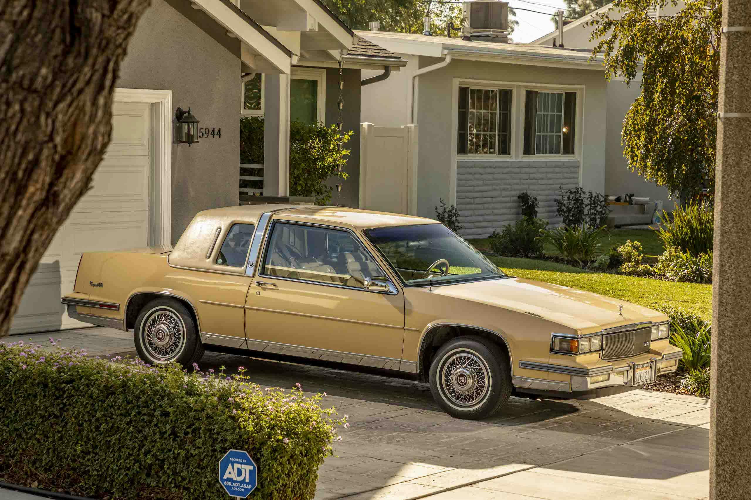 1986 Cadillac Coupe DeVille front three-quarter driveway