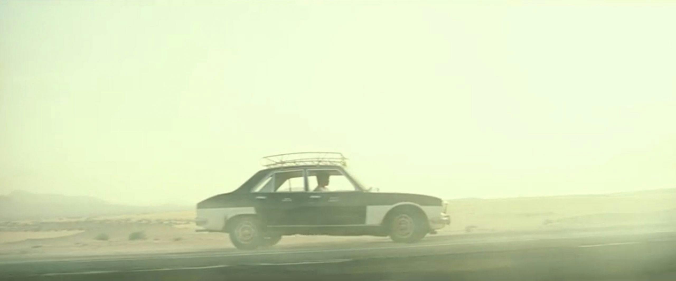 chris pine taxi chase scene dust cloud action