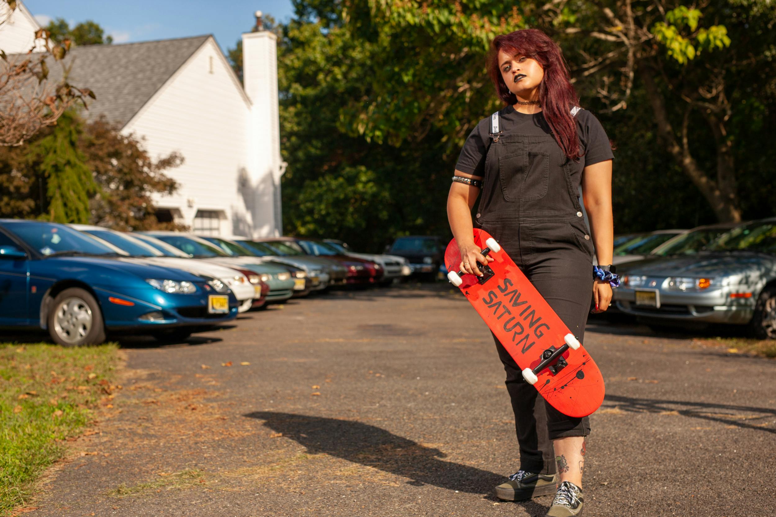 saturn enthusiast jessie skateboard standing profile