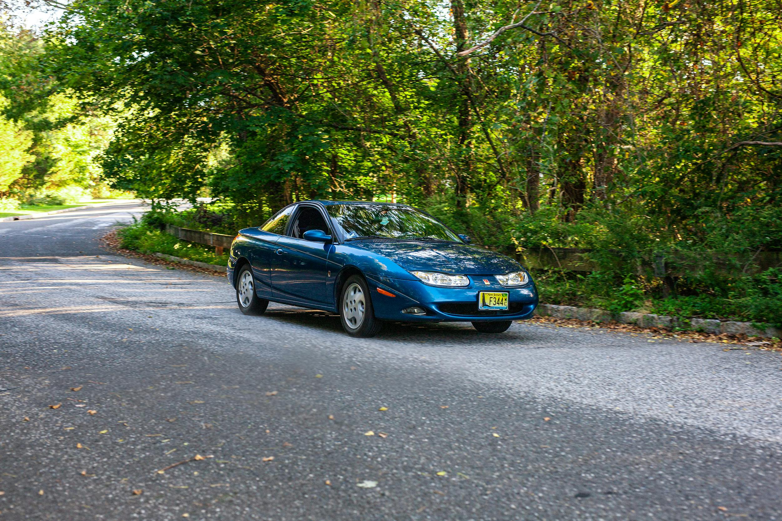 blue saturn coupe front three-quarter