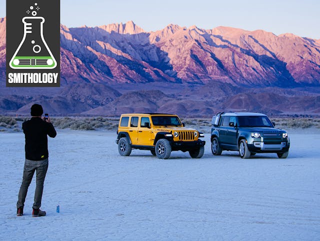 Jeep wrangler land rover defender front three-quarter sierra nevada mountains