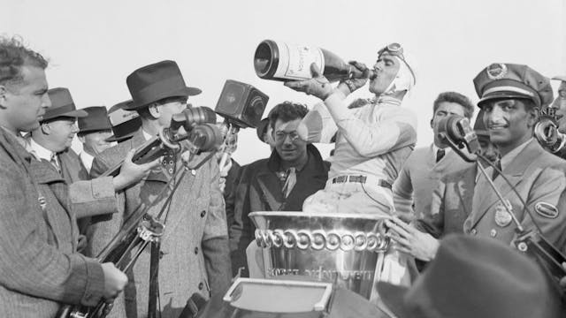 Tazio Nuvolari Drinking Champagne After Winning Race