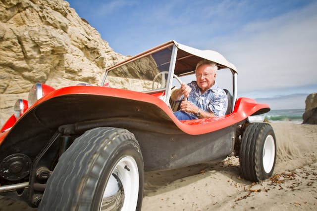 Meyers Manx Dune Buggy bruce behind wheel climbing dunes