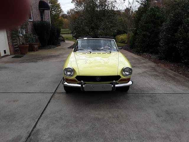 Norman Campbell yellow convertible roadster front