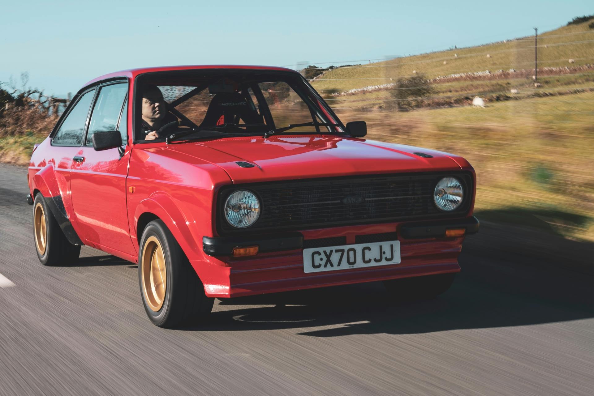 MST Mk2 front three-quarter driving action close