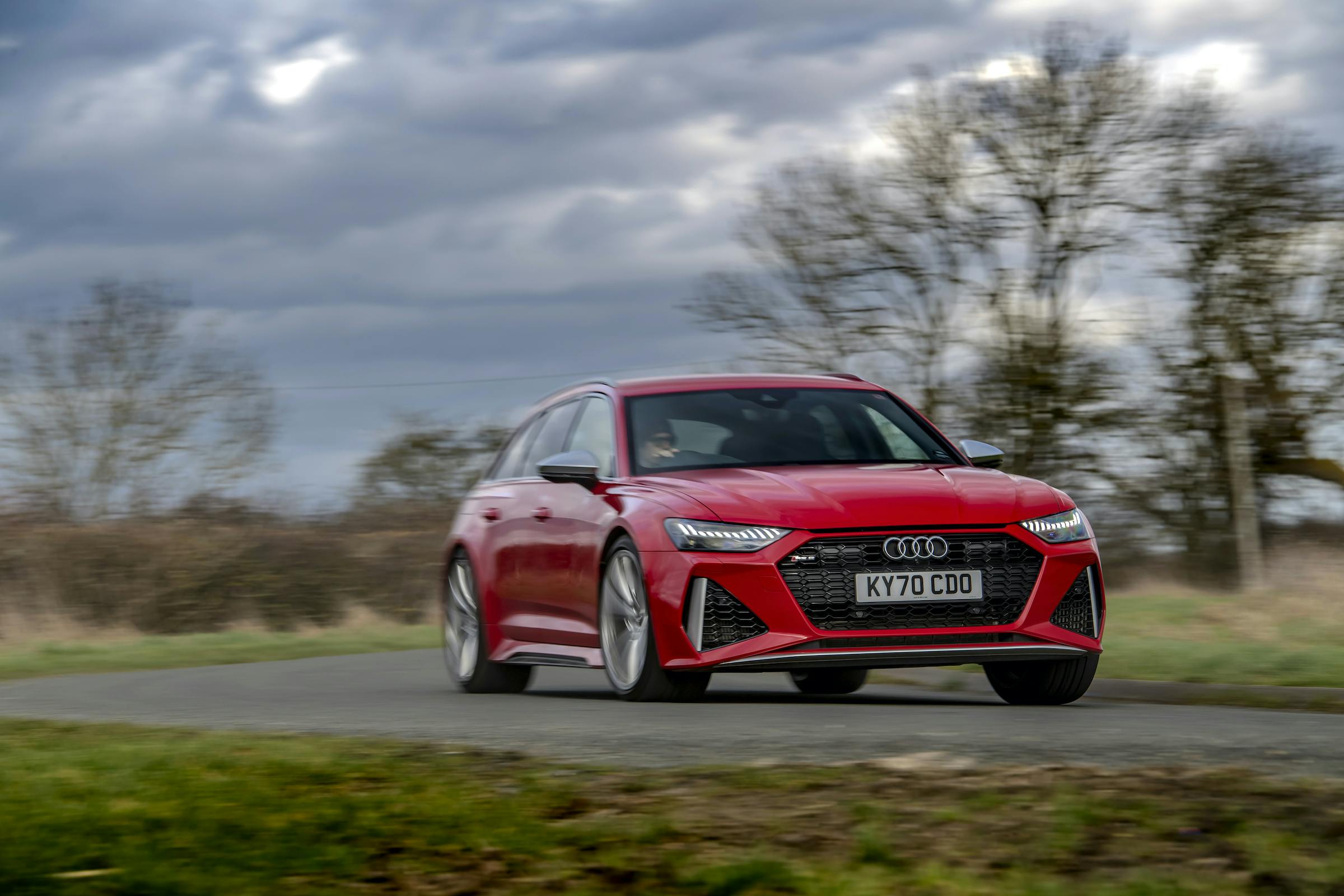 Audi RS6 front three-quarter dynamic driving action