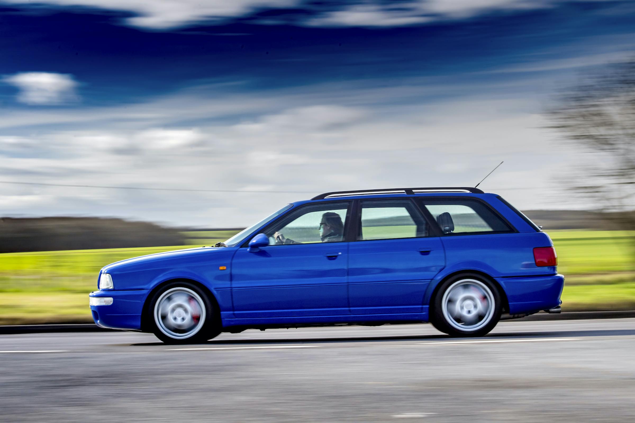 Audi RS2 side profile driving dynamic action