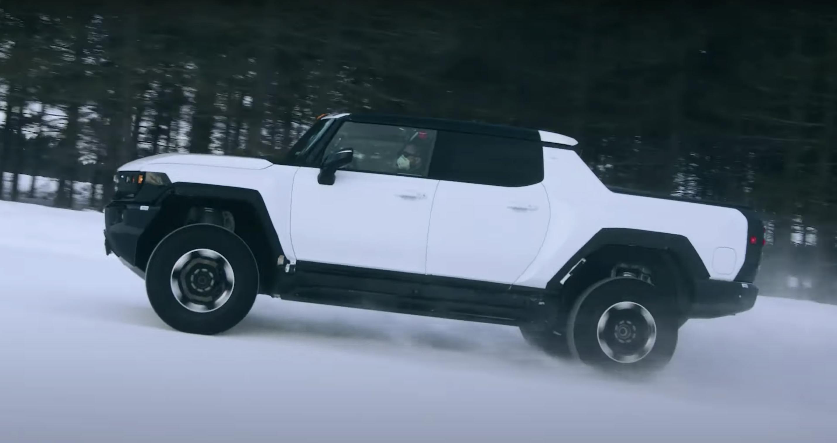 Hummer EV pickup winter testing profile camo snow