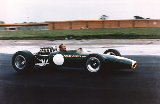 Colin Chapman in Lotus 49 at Hethel