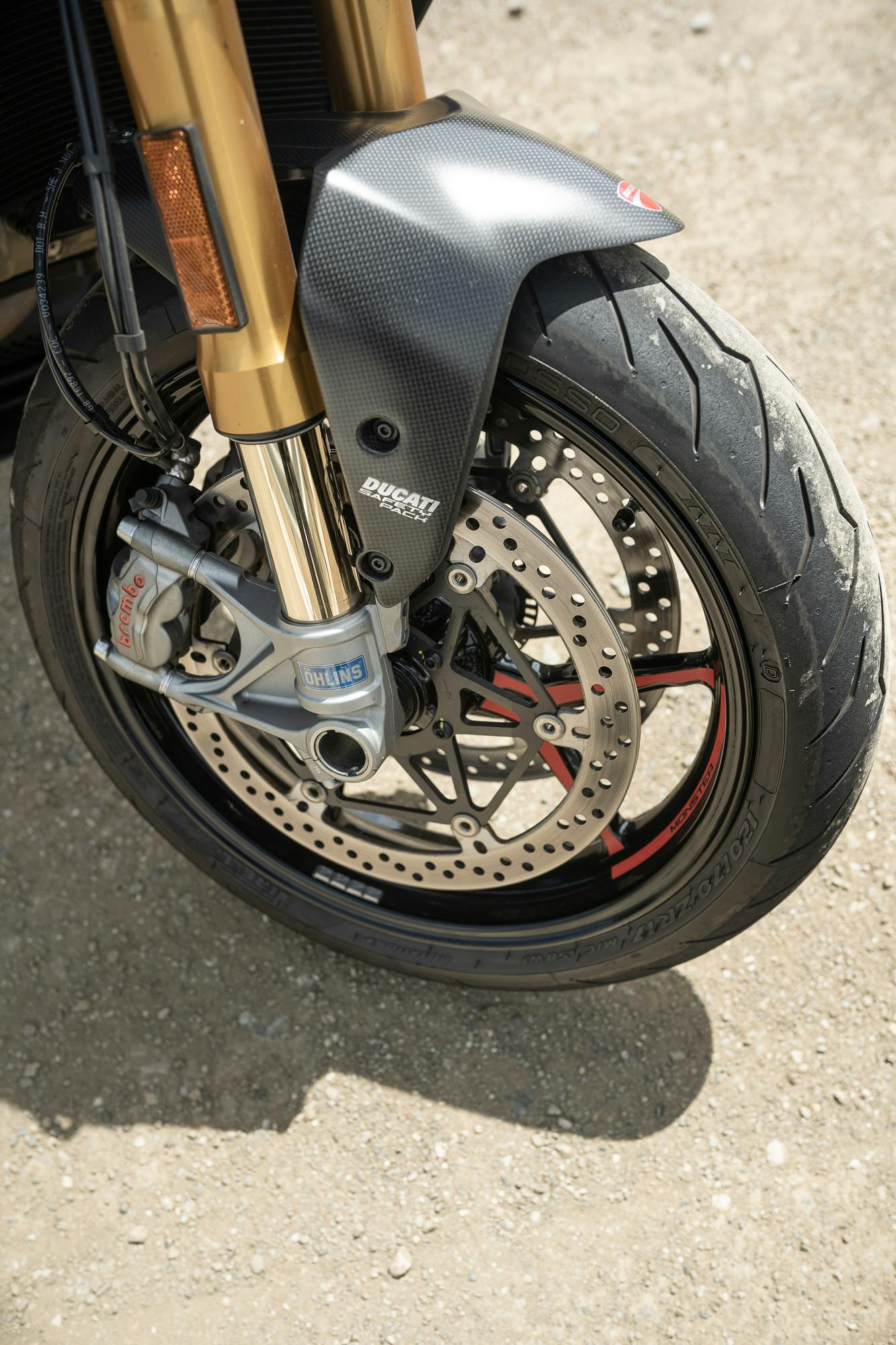 2021 Ducati Monster 1200 S front wheel detail vertical