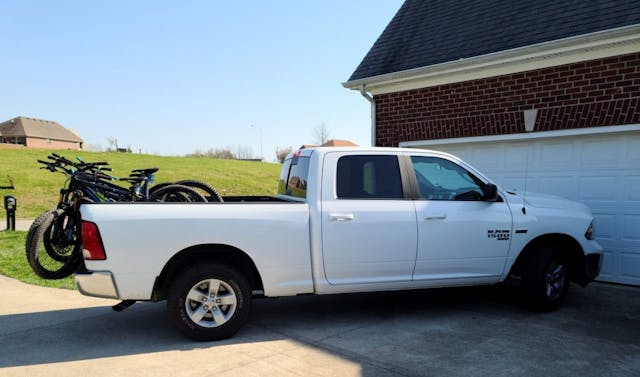 2020 Ram 1500 Classic 4x4 Tradesman SLT side with bikes 