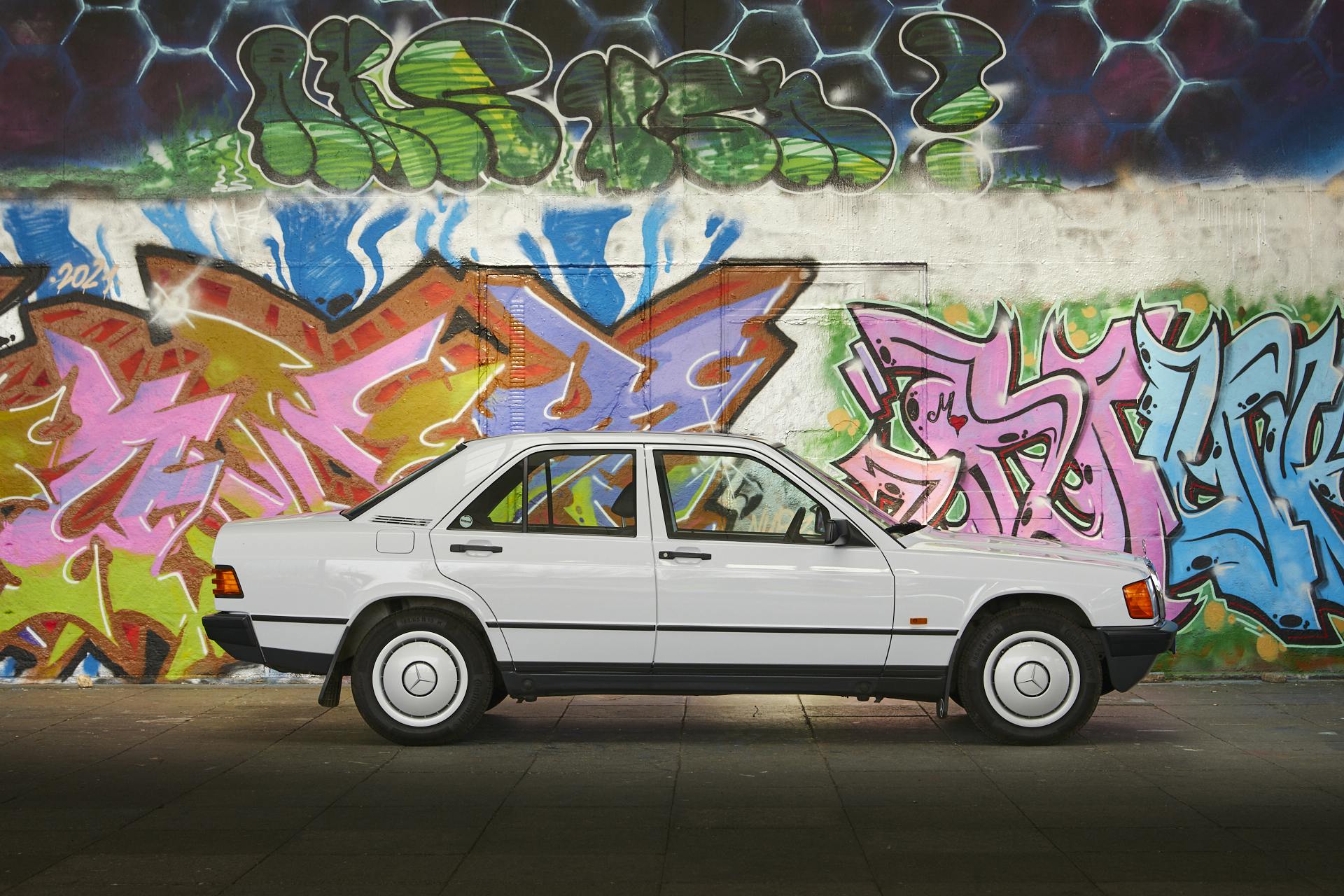 Mercedes 190E side profile graffitti wall