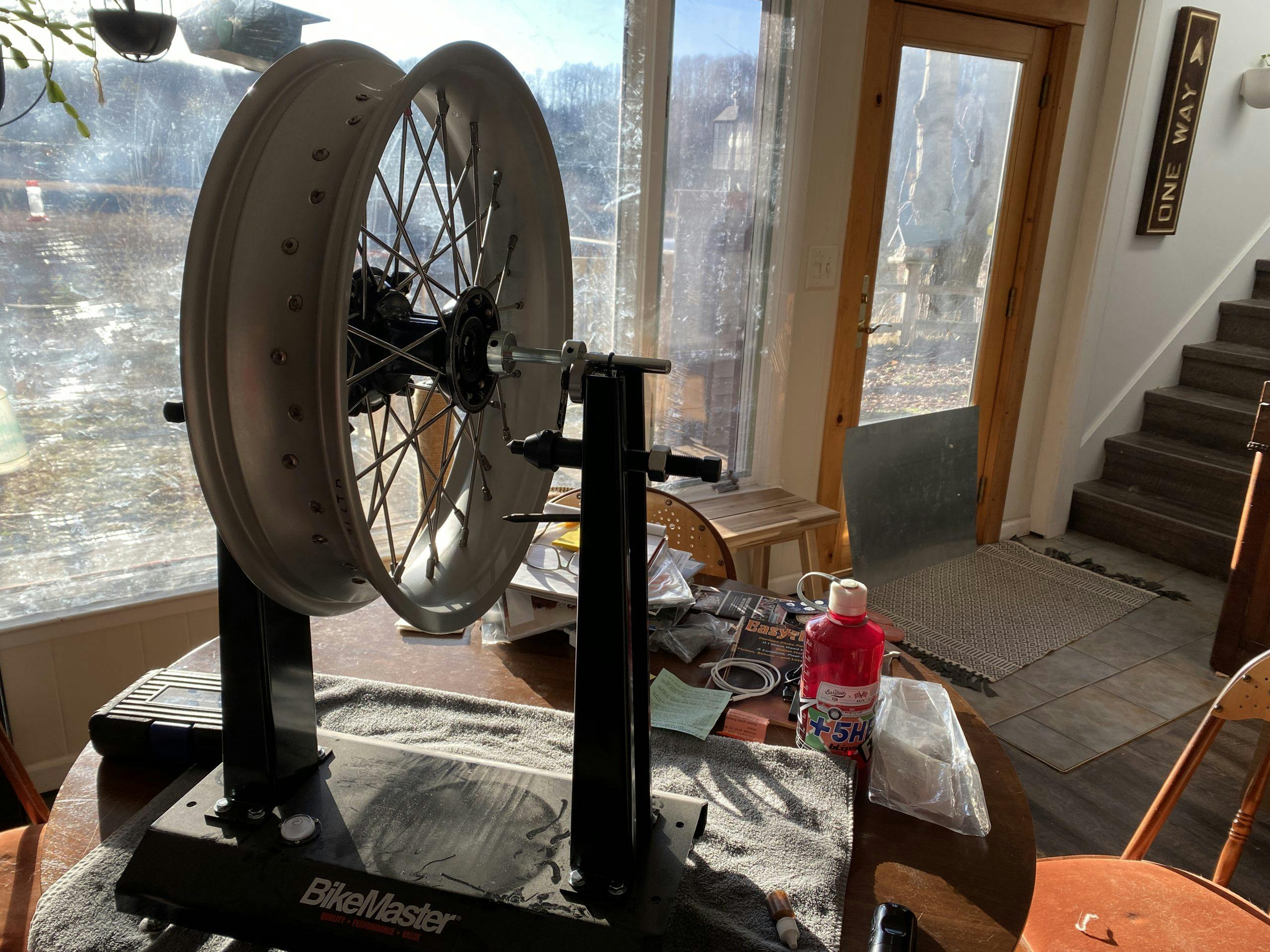 motorcycle wheel on truing stand