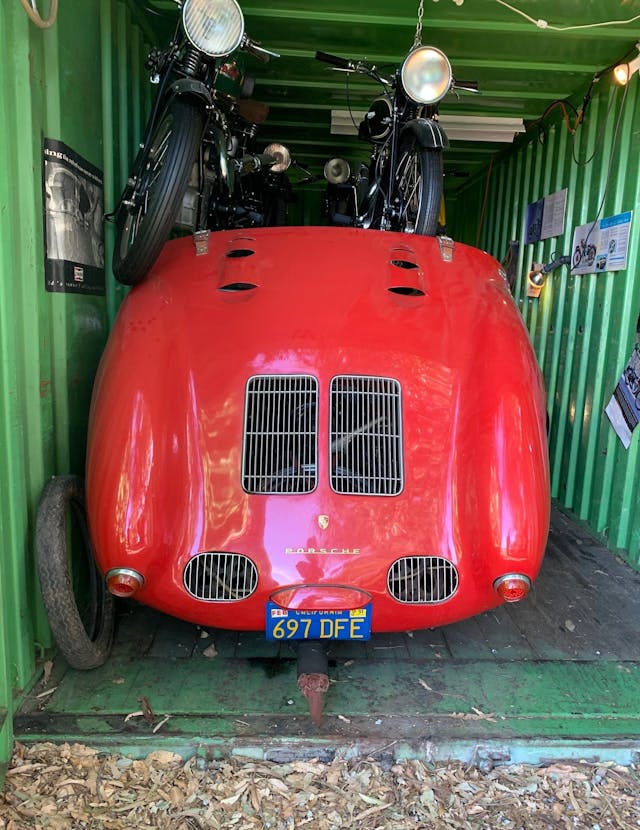 Old Crow - 1955 Porsche 550 Spyder - rear in container with bikes overhead