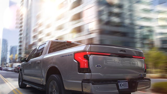 Ford F-150 Lightning EV rear three-quarter urban action