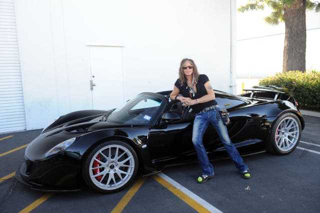 Tyler proudly poses by his Venom GT Spyder
