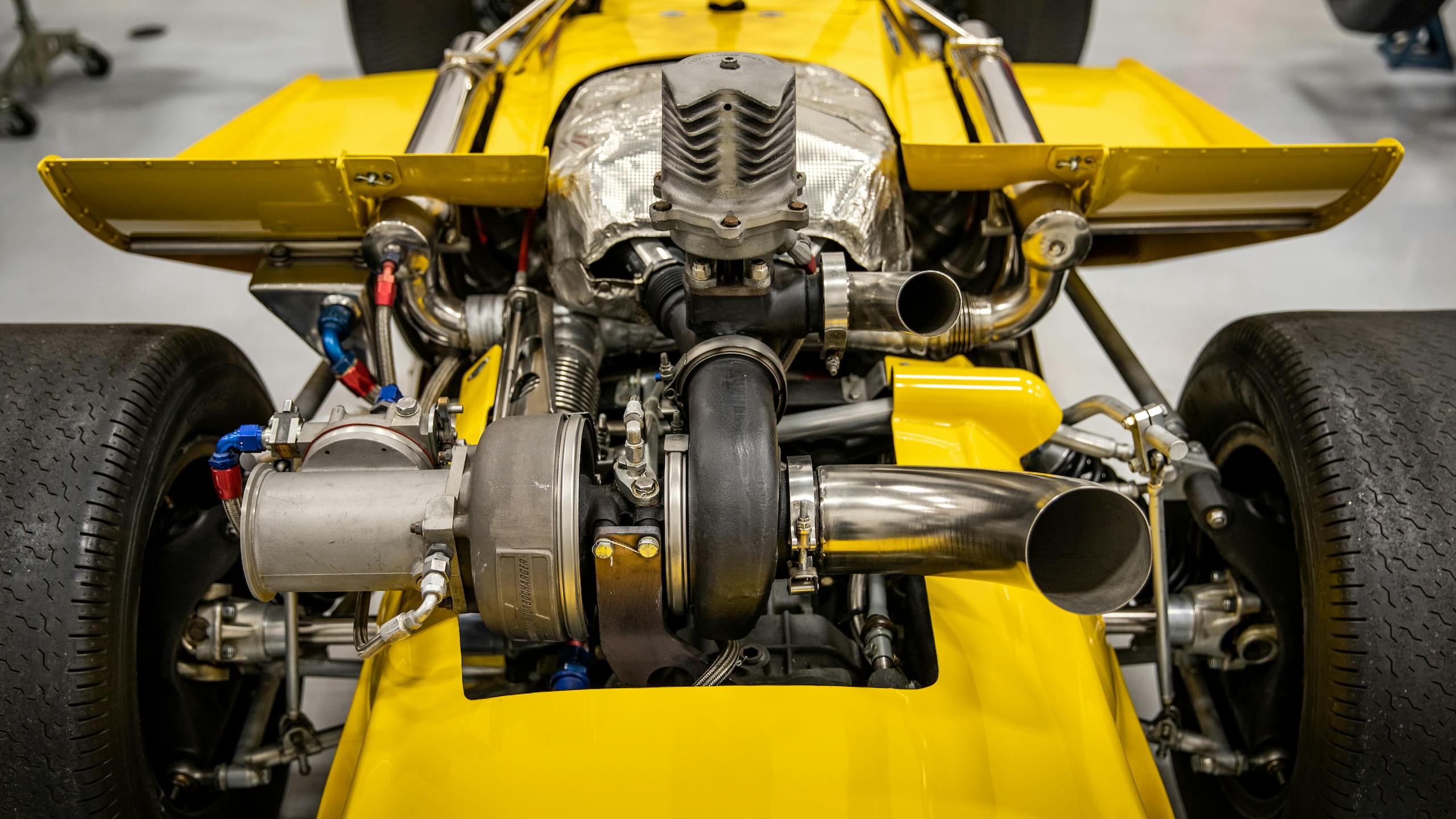 Turn 4 Restorations yellow racer engine