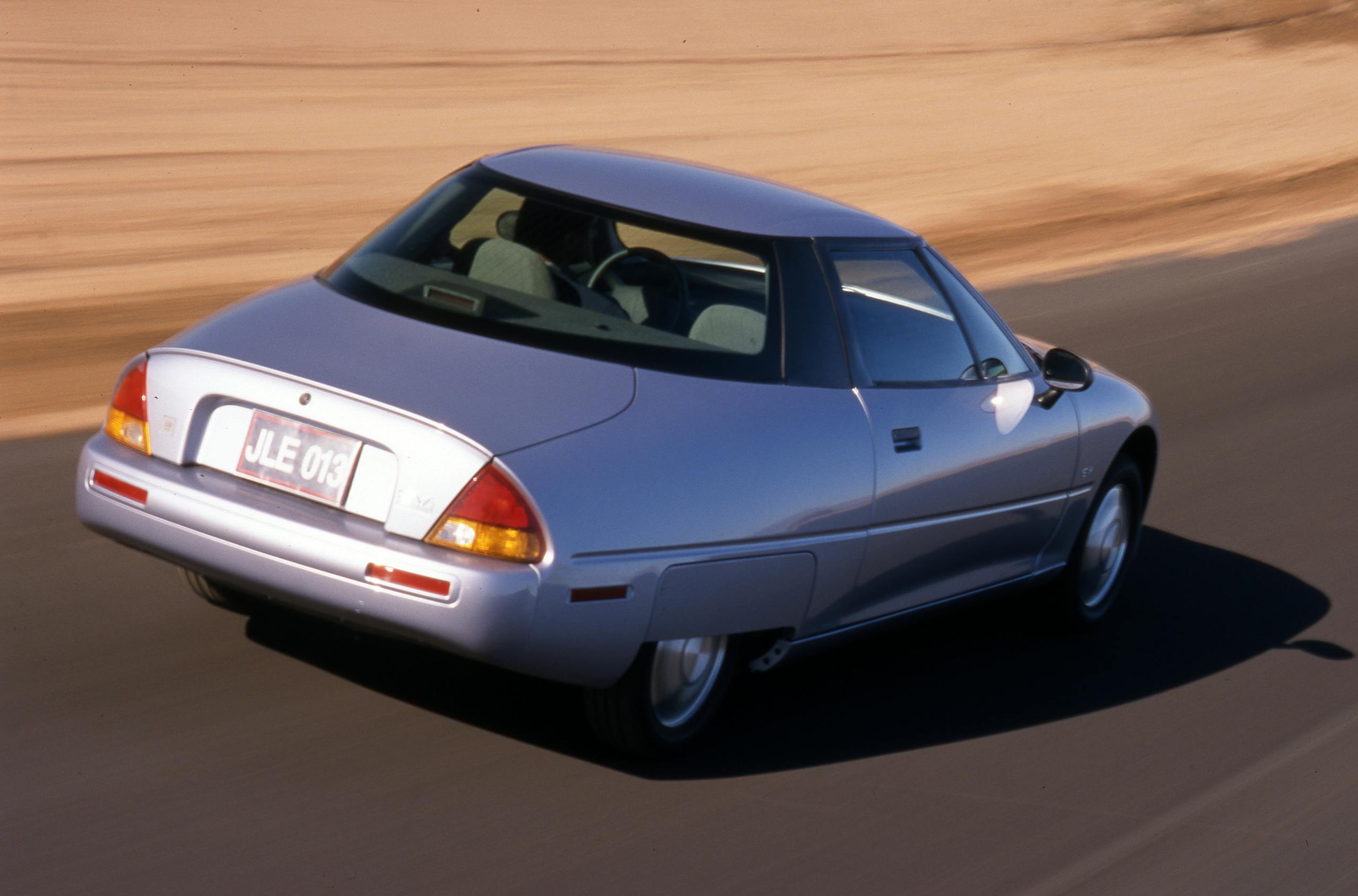 1997 GM EV1 Electric Vehicle rear three-quarter action