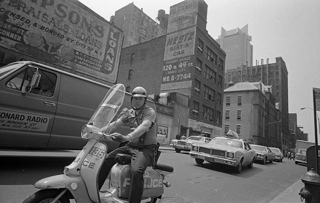 NYPD Officer Patroling Midtown Manhattan on Lambretta