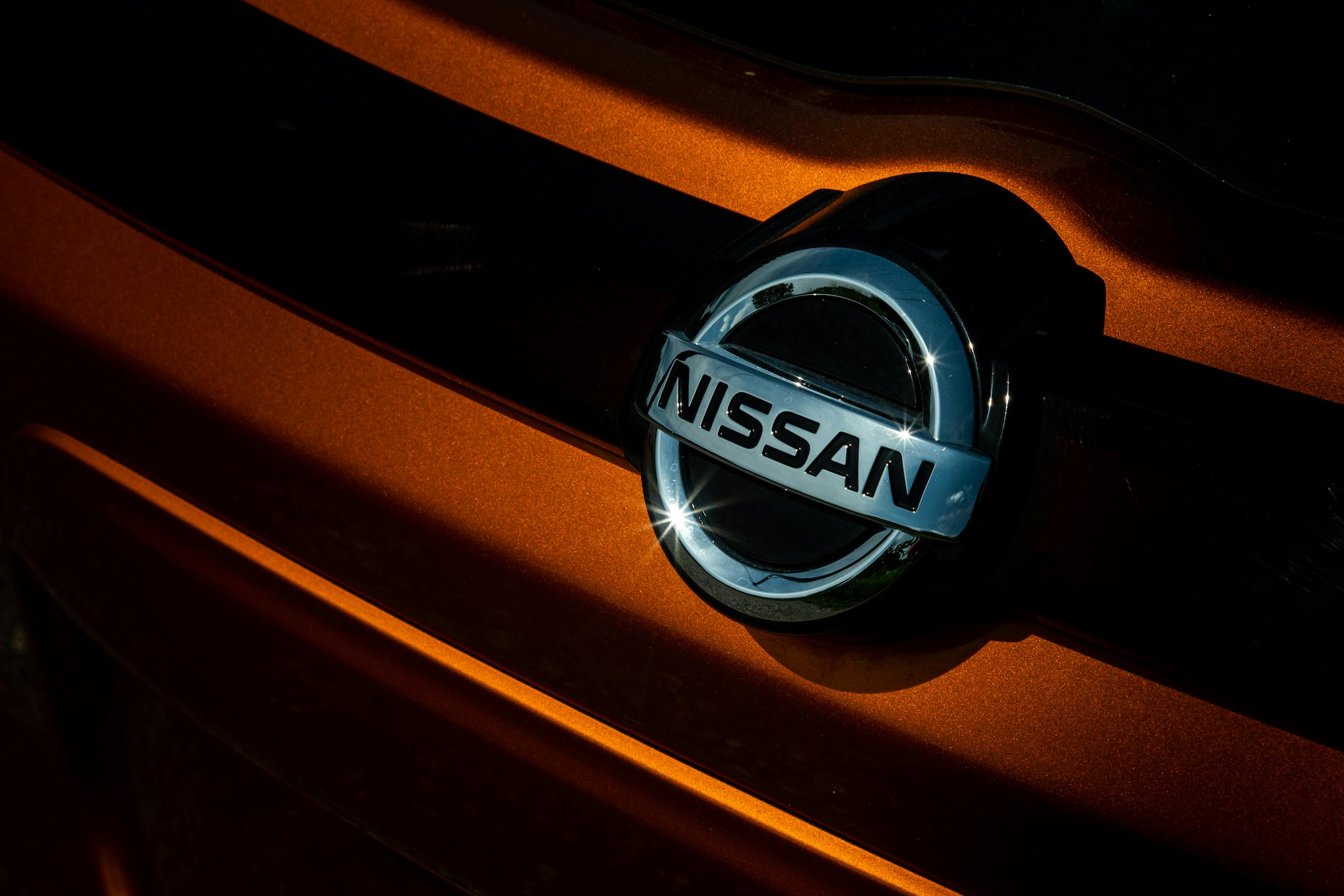 Nissan Kicks grille emblem badge