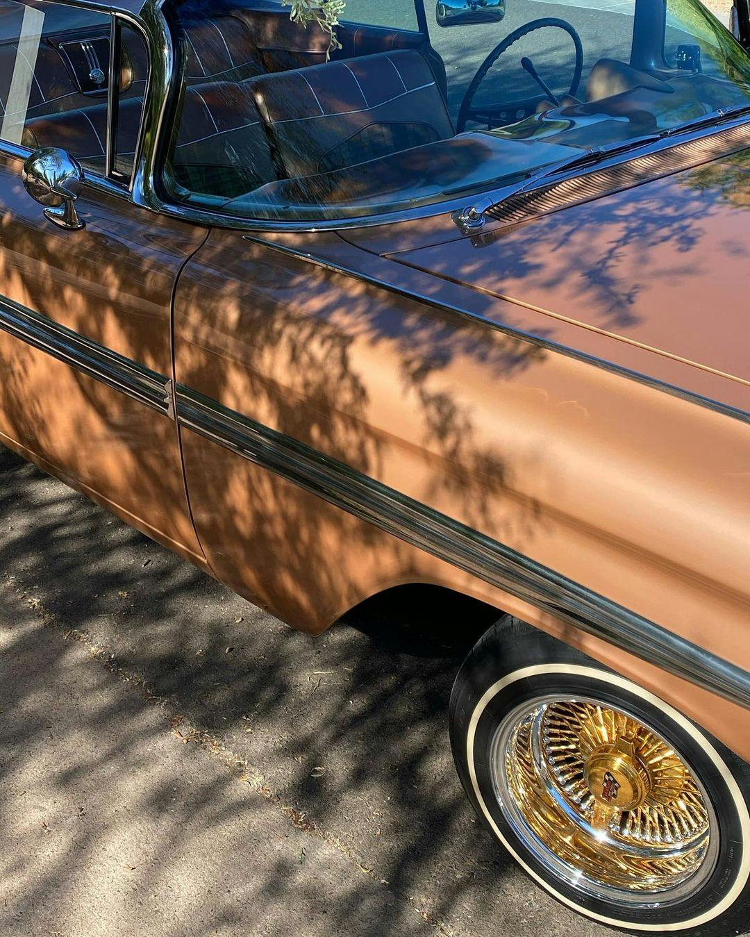 Devin Booker Impala rim and quarter panel
