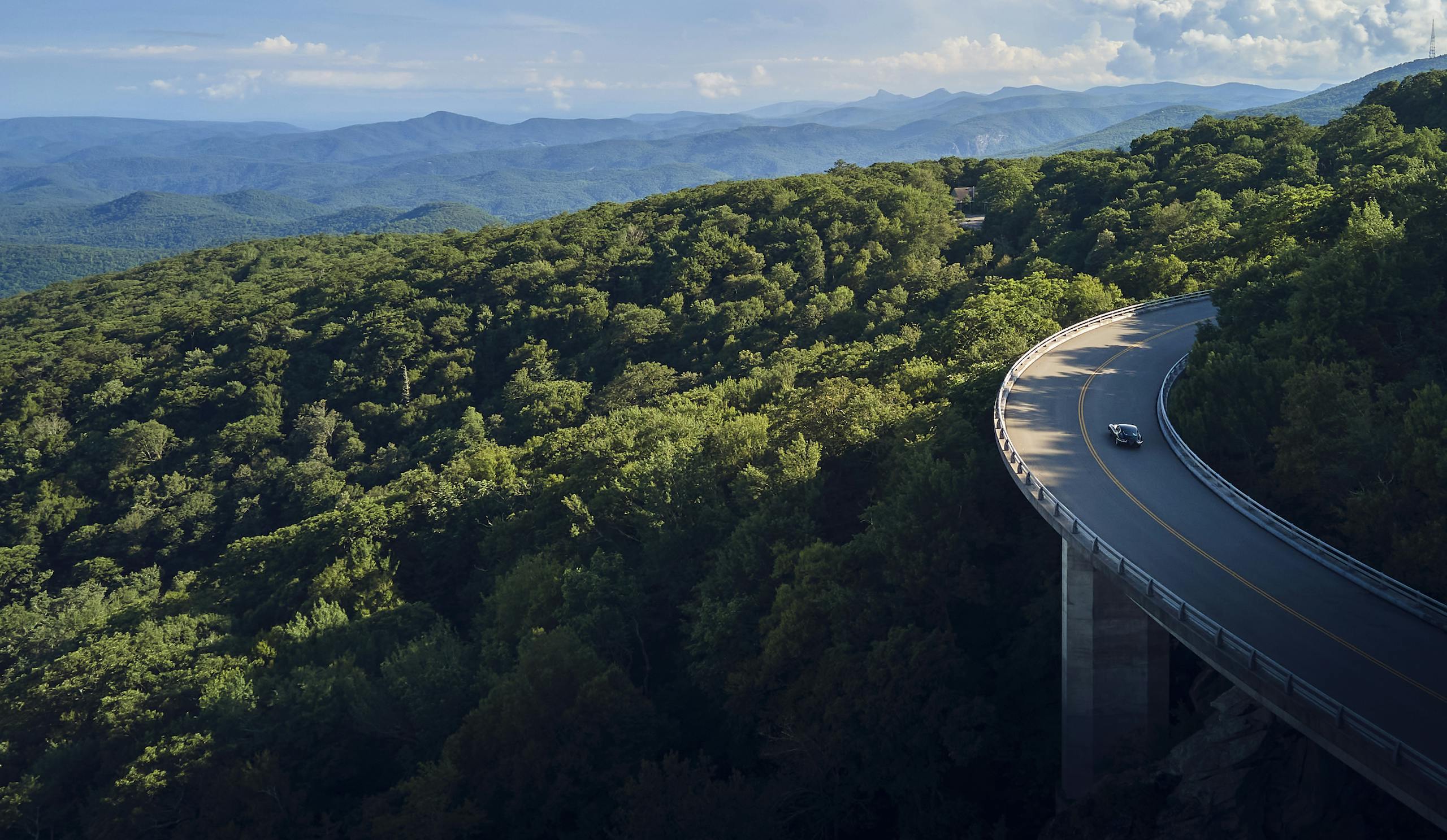 Jaguar E-Type mountain range bridge