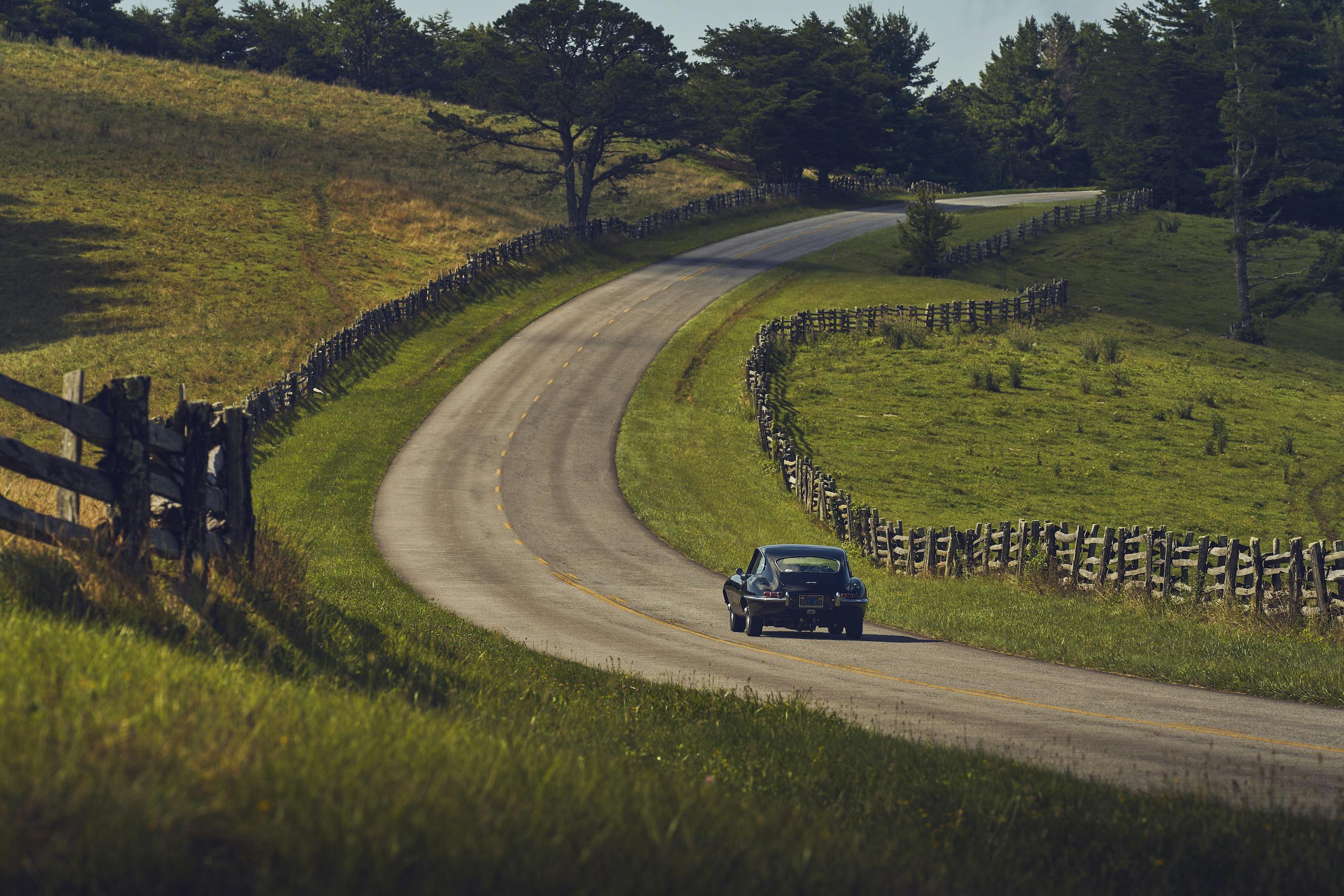 Jaguar E-Type rear rural road