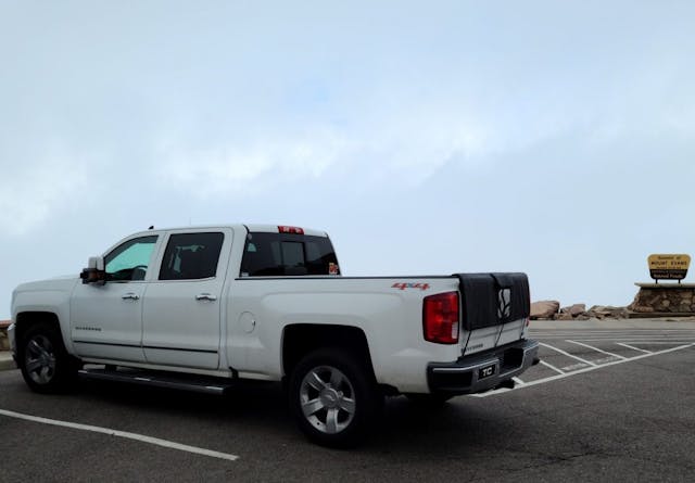 white 6.2 silverado rear three-quarter mount evans