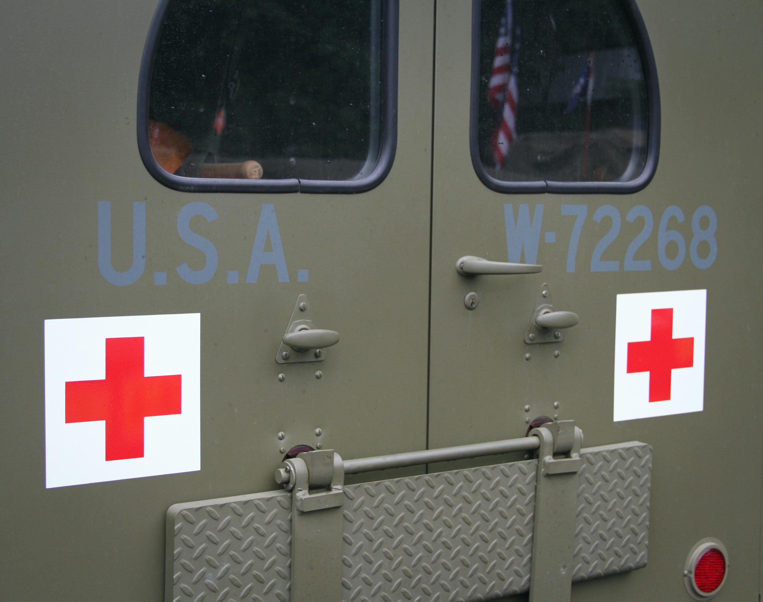 Military vehicle convoy ambulance rear doors