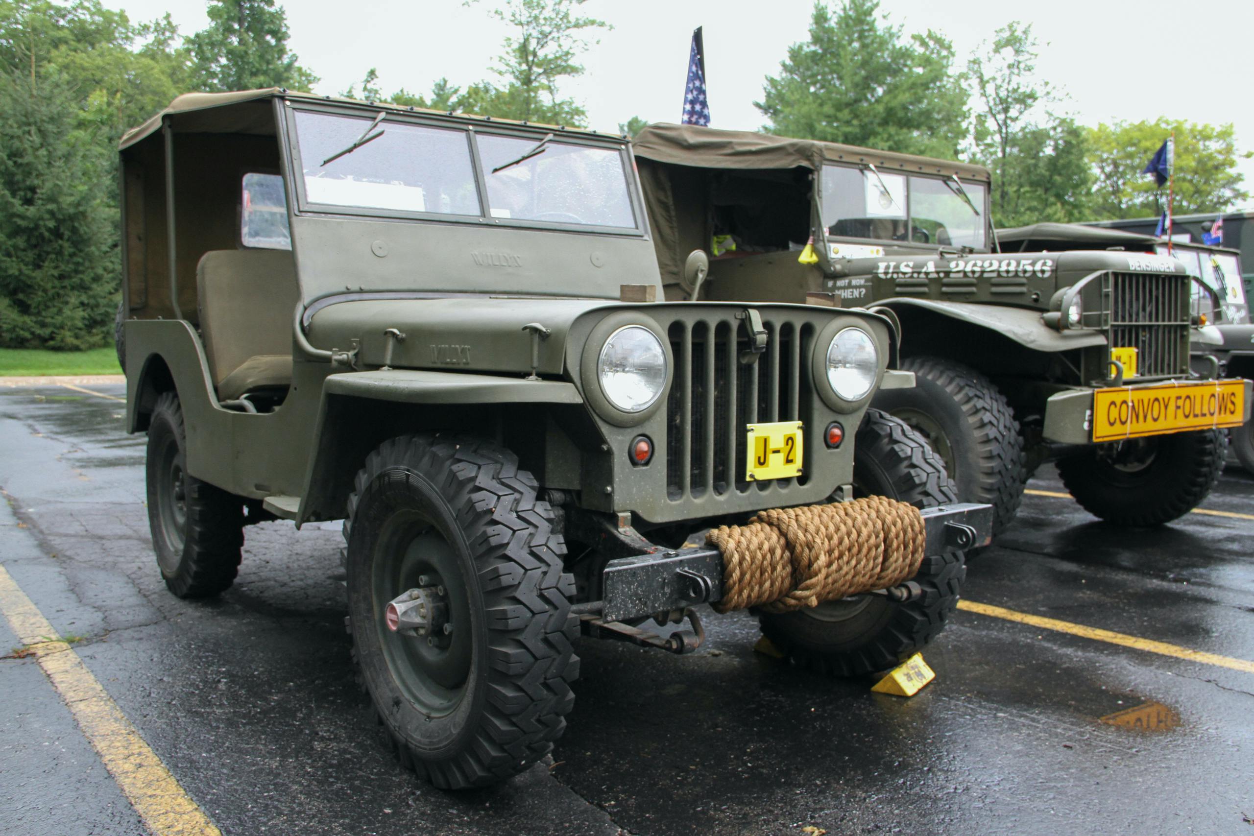 Military vehicle convoy jeep front three-quarter