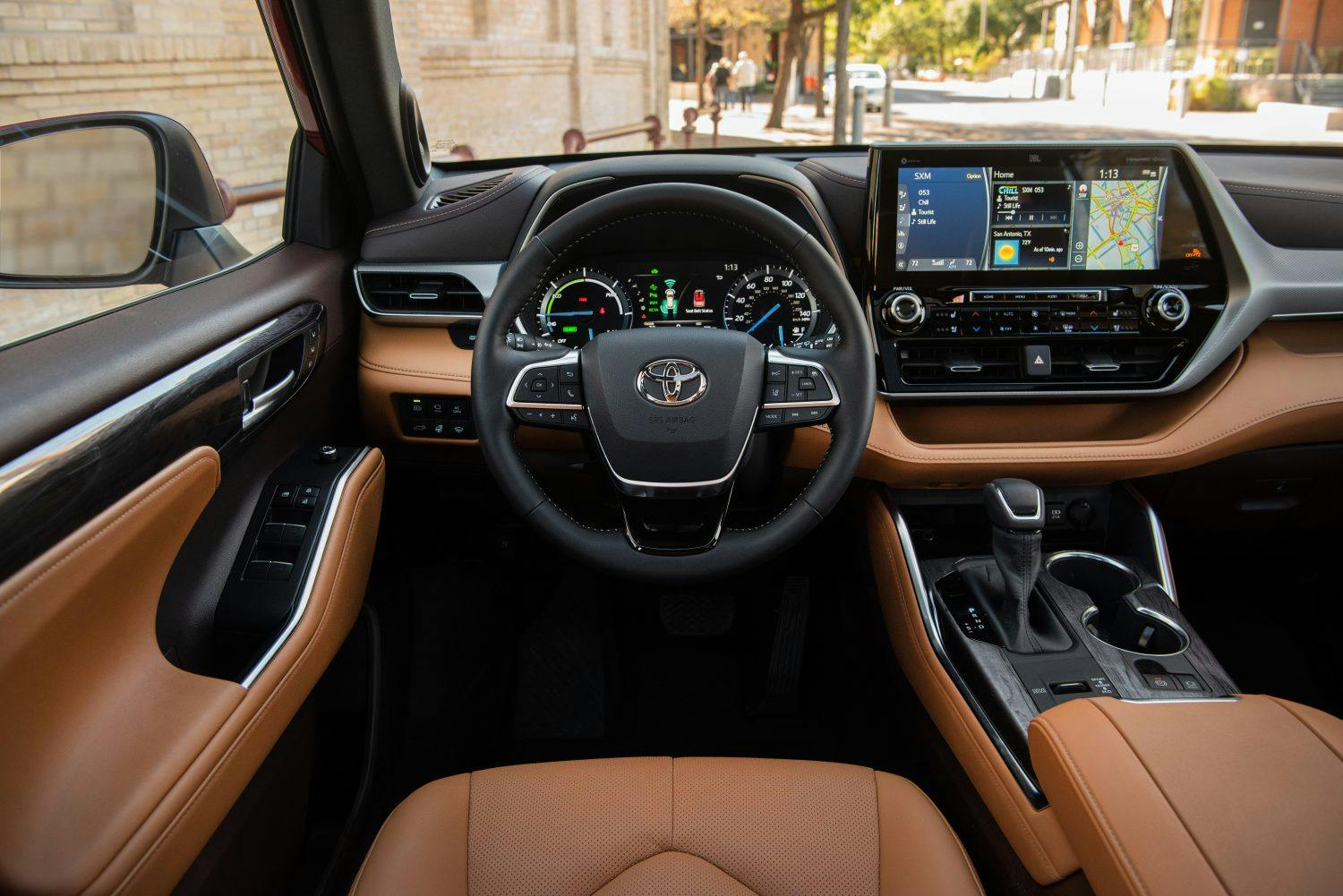 2021 Toyota Highlander Hybrid Platinum AWD driver's seat view