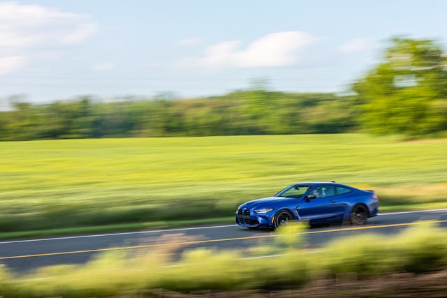 BMW M4 dynamic driving action wide