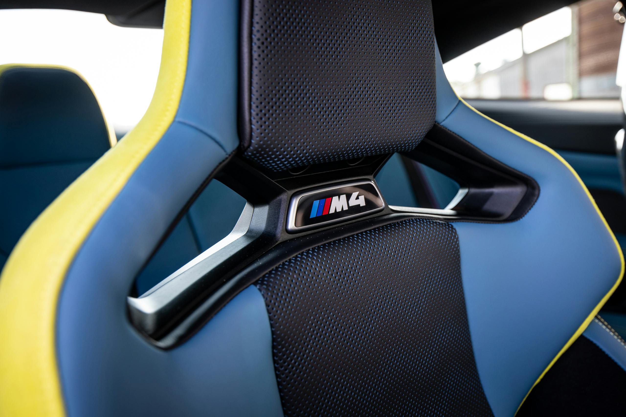 2021 BMW M4 interior front sport seat detail