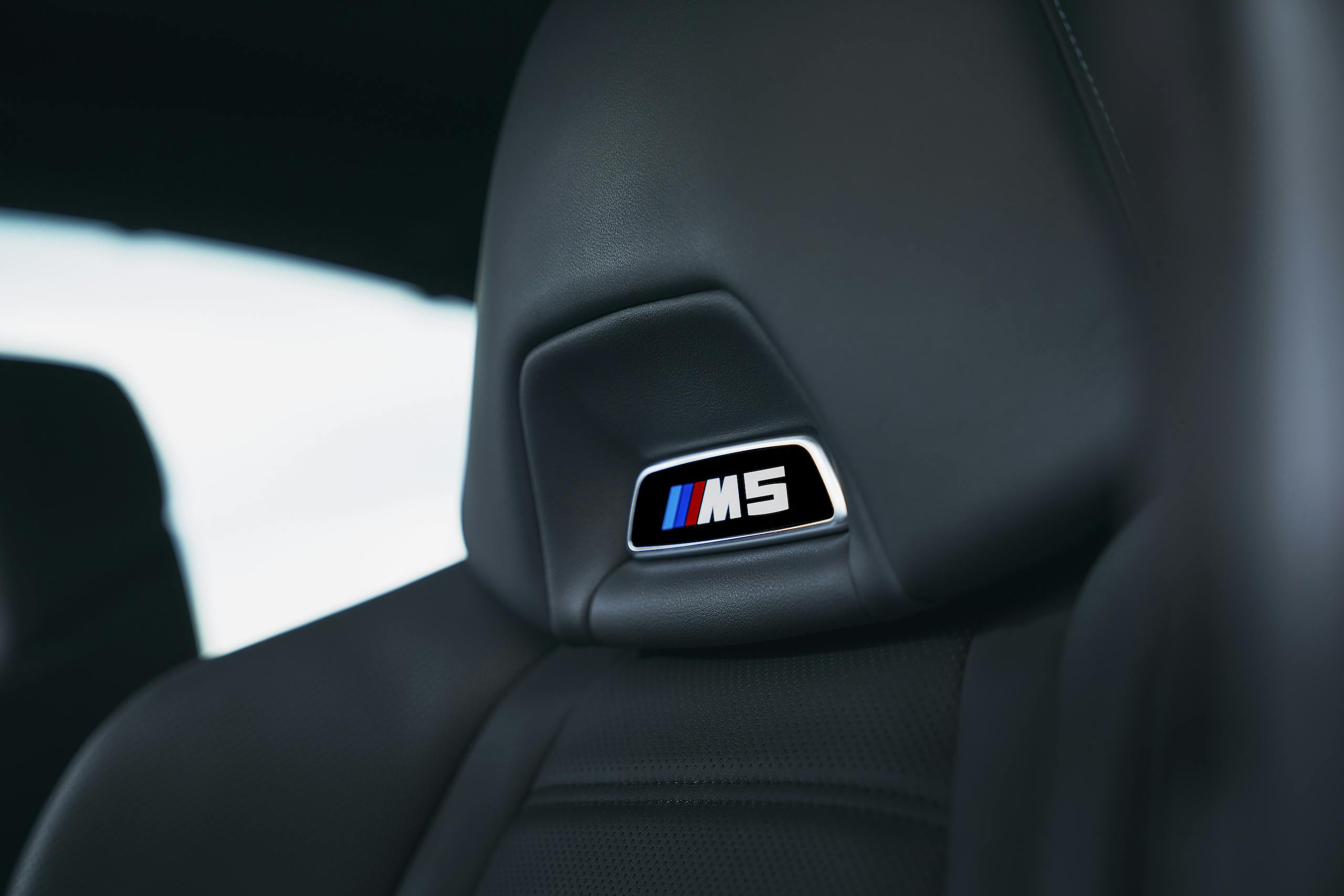 2021 BMW M5 Competition interior seat badge detail