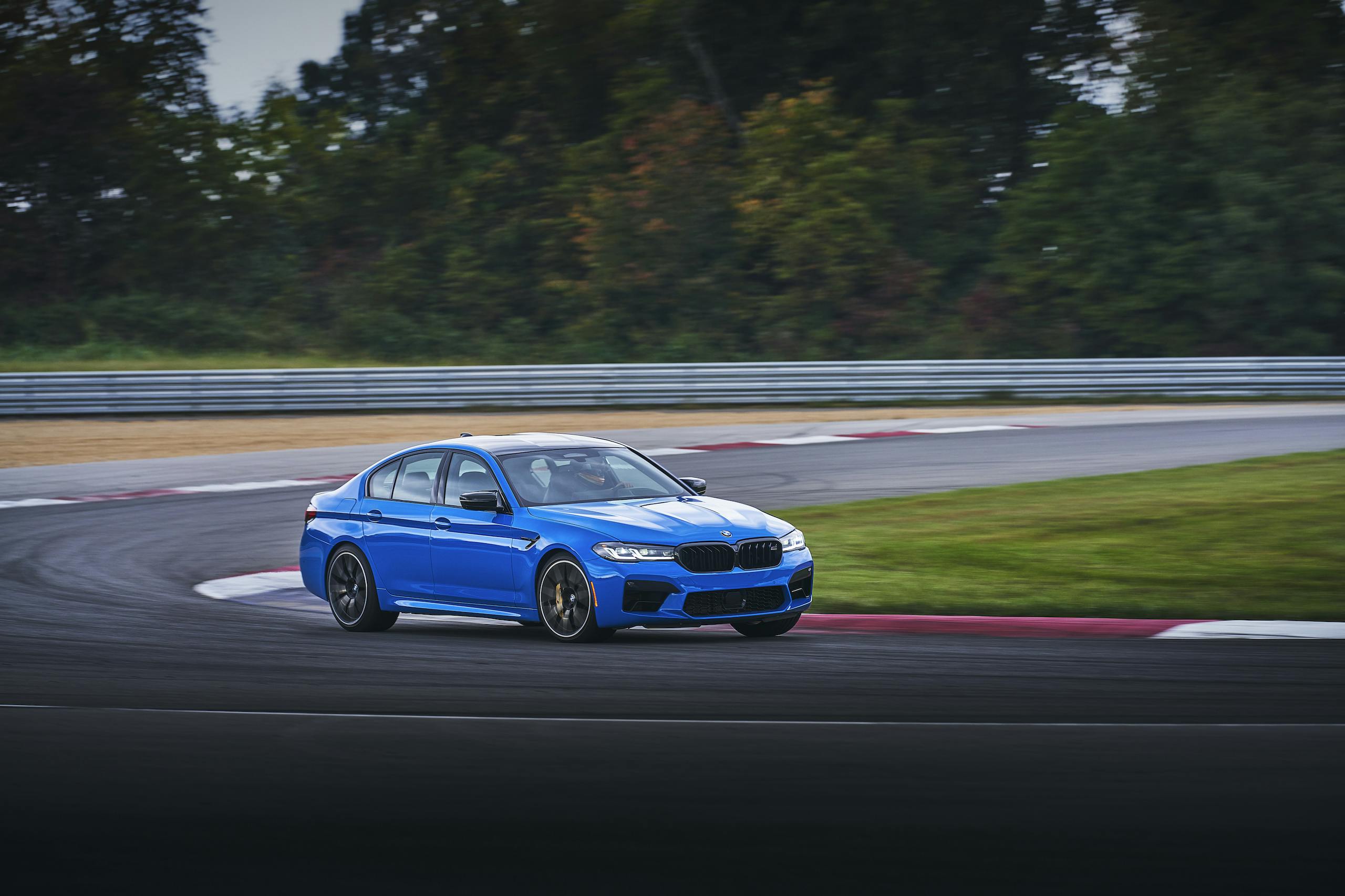2021 BMW M5 Competition front three-quarter track action