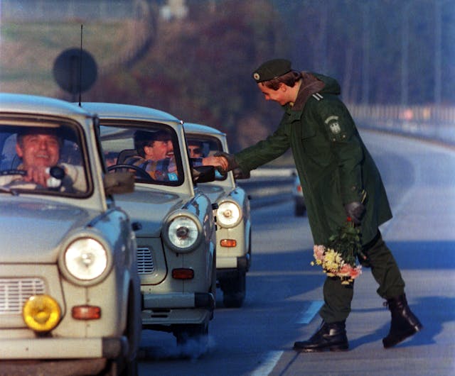 East Germans cross border Trabant