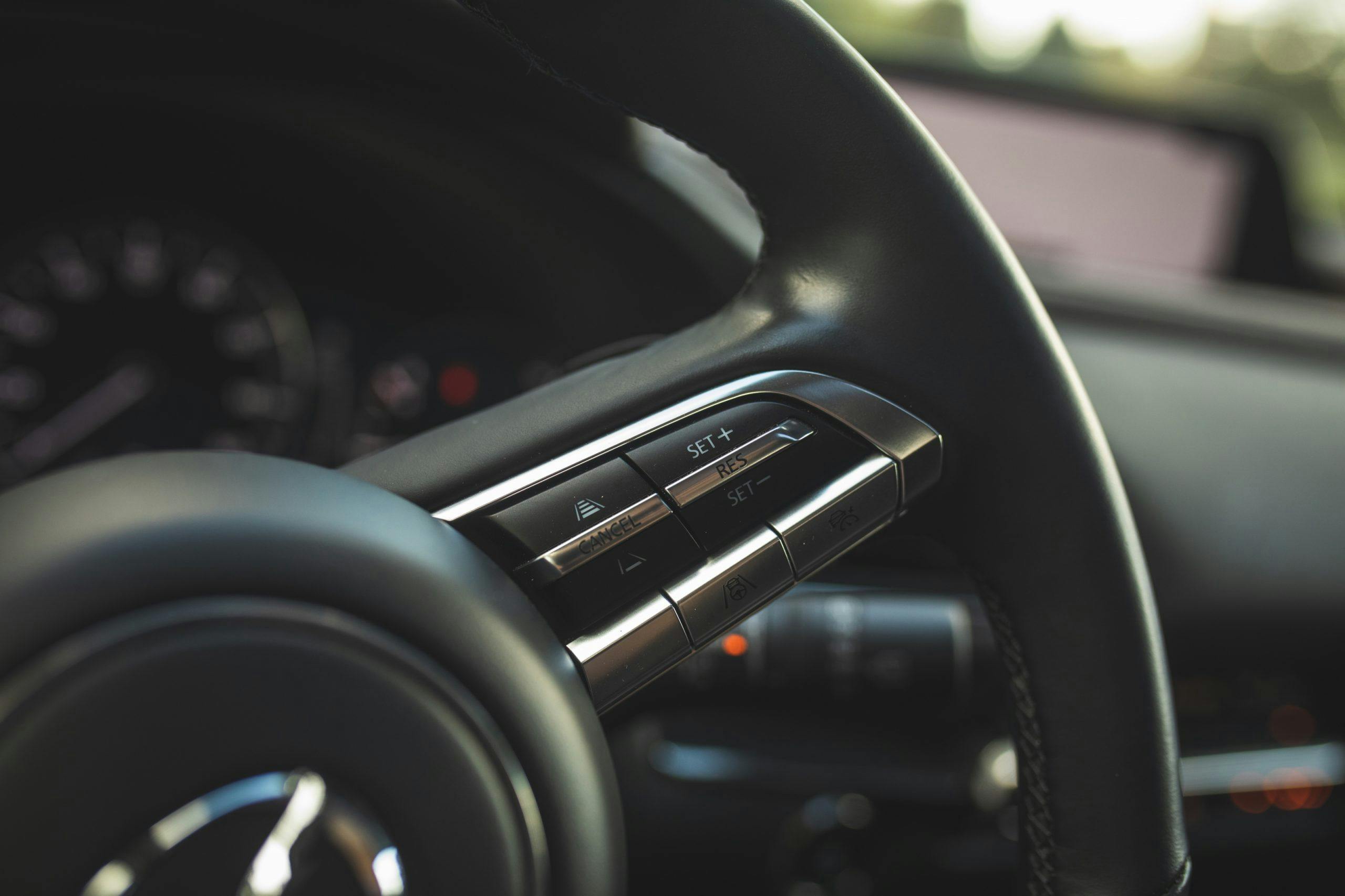Mazda CX30 interior steering wheel controls
