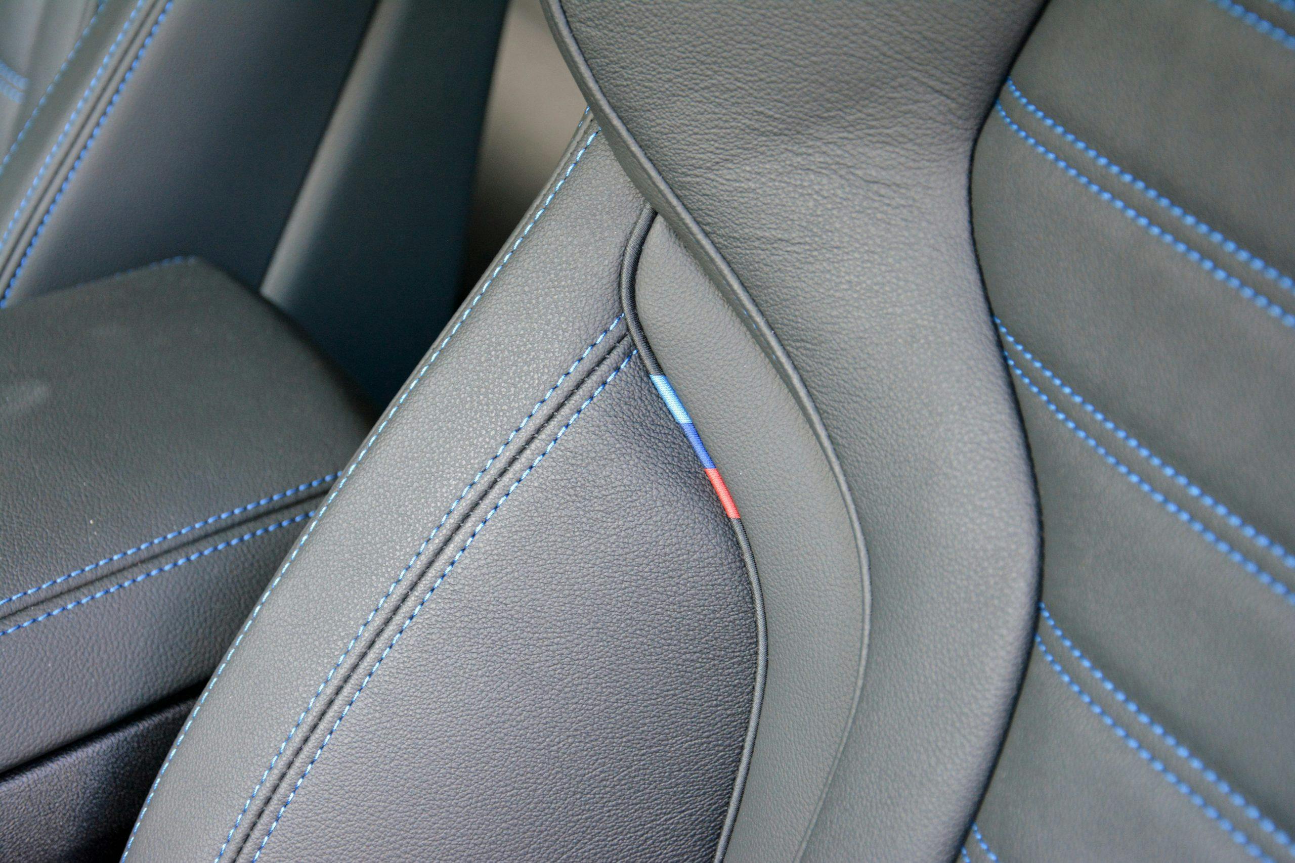 2022 BMW i4 M50 interior leather seat stitching detail