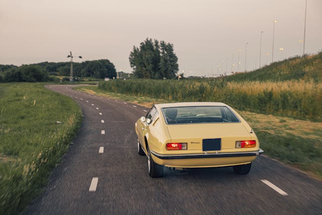 Ghibli 4-7 Coupe rear three-quarter driving action