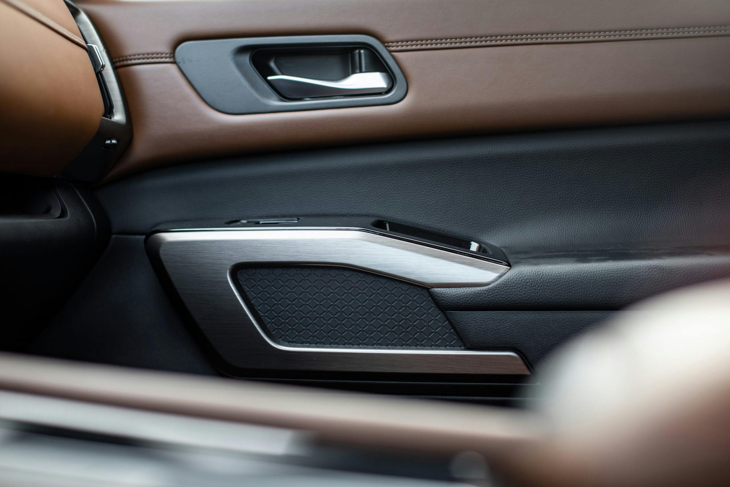 2022 Nissan Pathfinder Platinum interior door panel trim detail